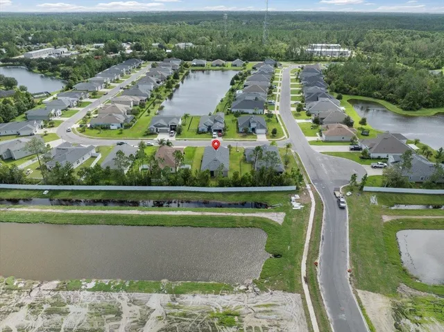 an aerial view of a city with lots of residential buildings