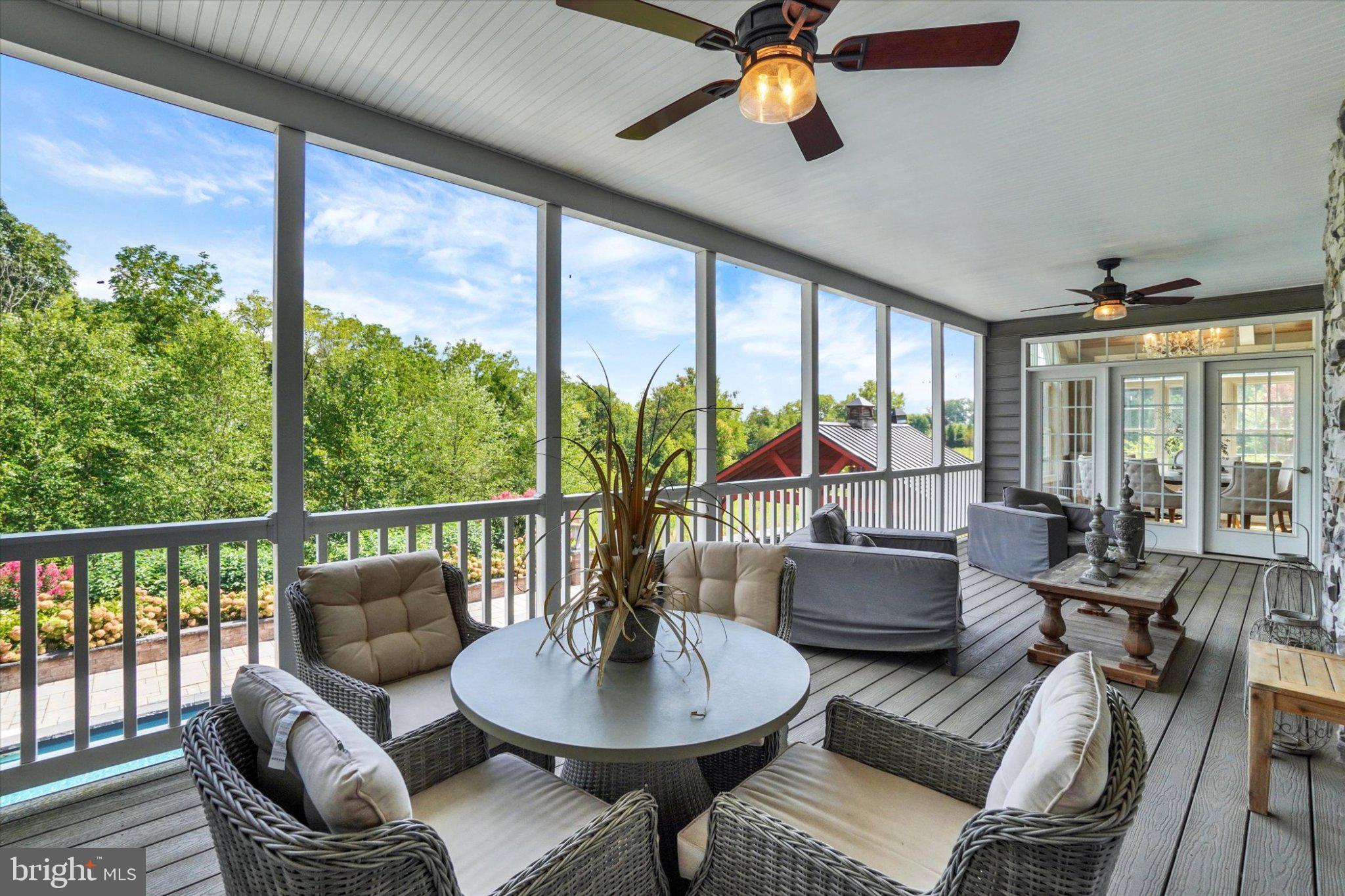 2811 Iron Stone Hill Road York, PA 17403 - Photo 15 of 60 Screened-in deck overlooks the pool area