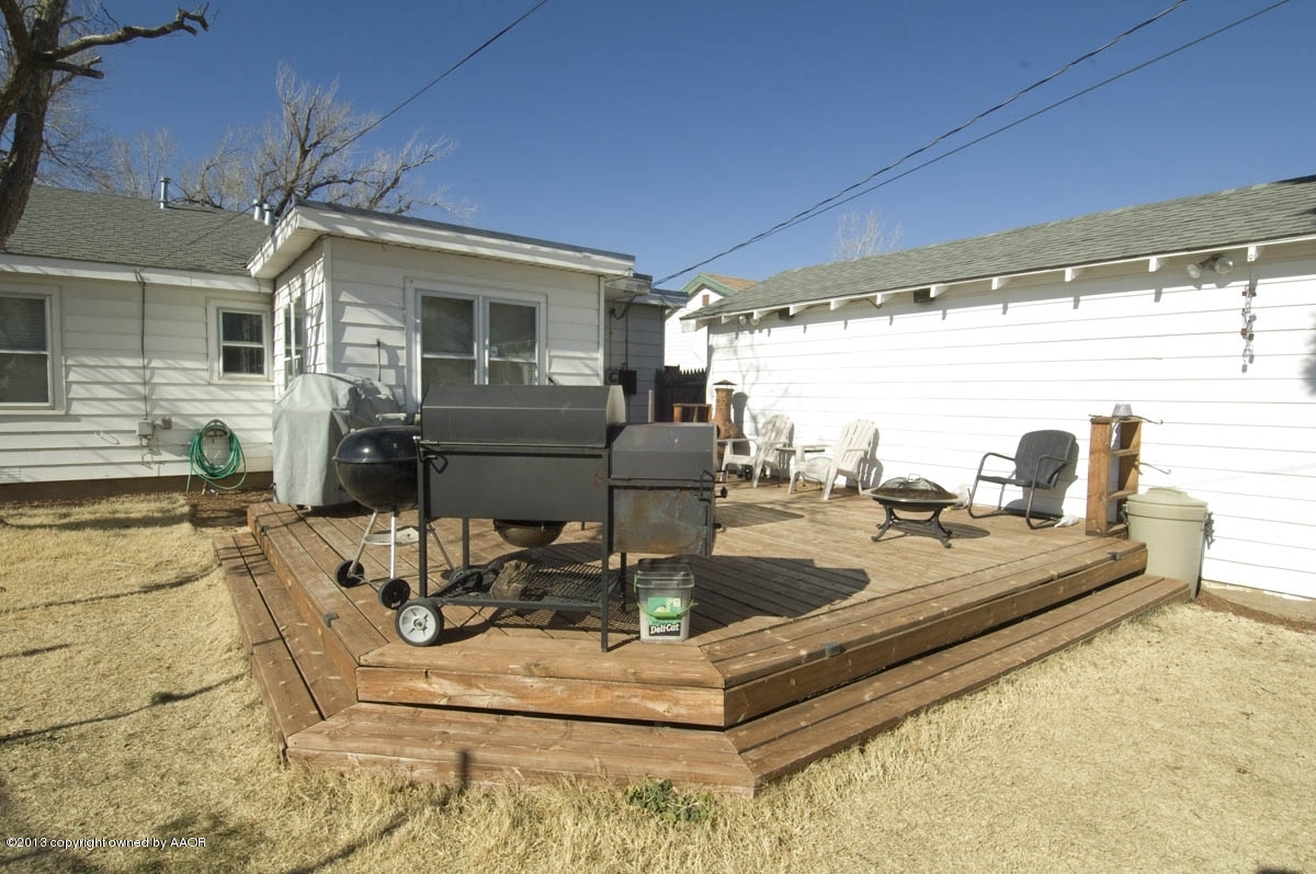 4227 South Jackson Street Amarillo, TX 79110 - Photo 22 of 23 a view of a patio with swimming pool table and chairs
