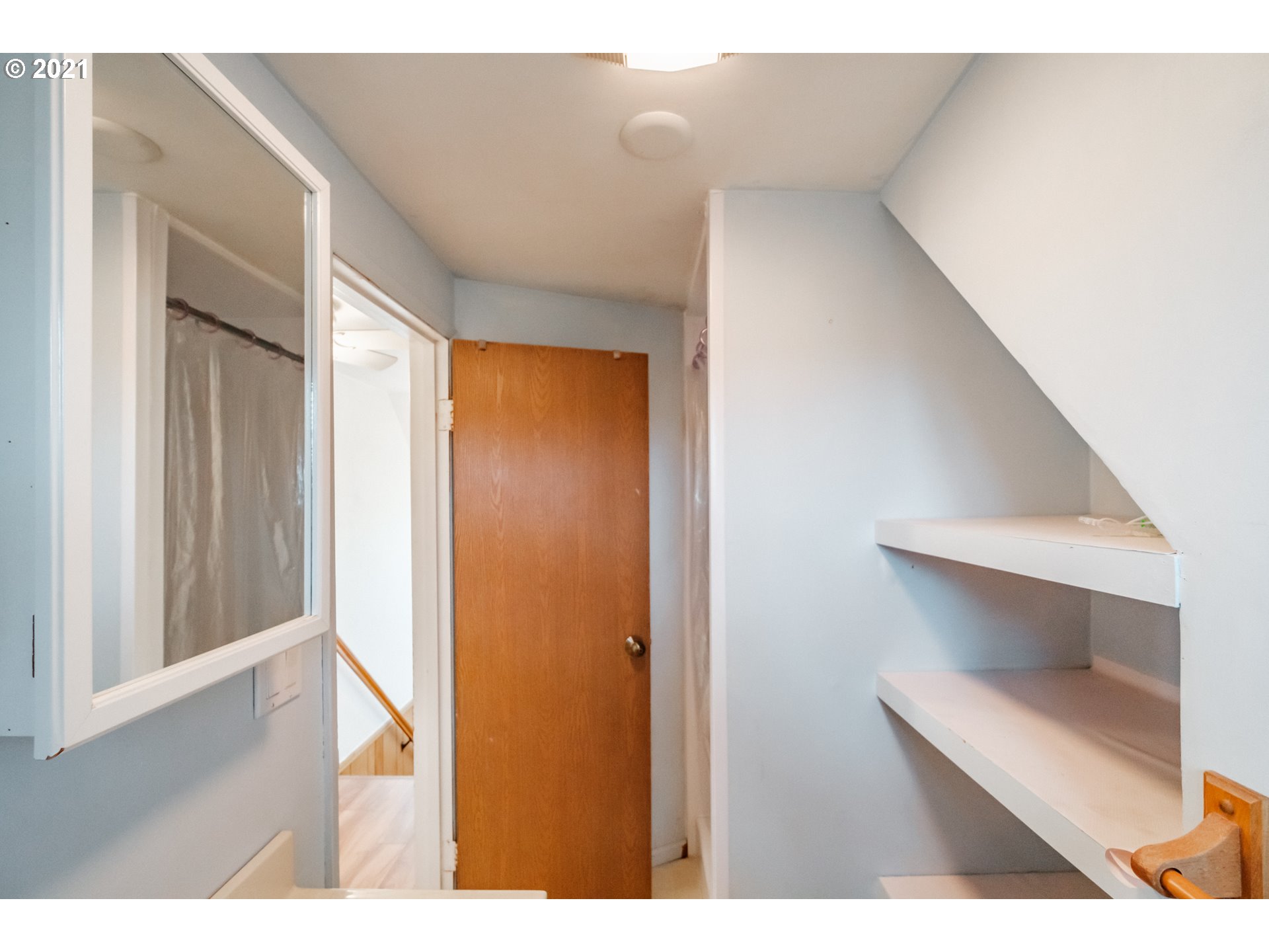 1005 Cascade Drive Lebanon, OR 97355 - Photo 23 of 32 a view of an entryway with wooden floor