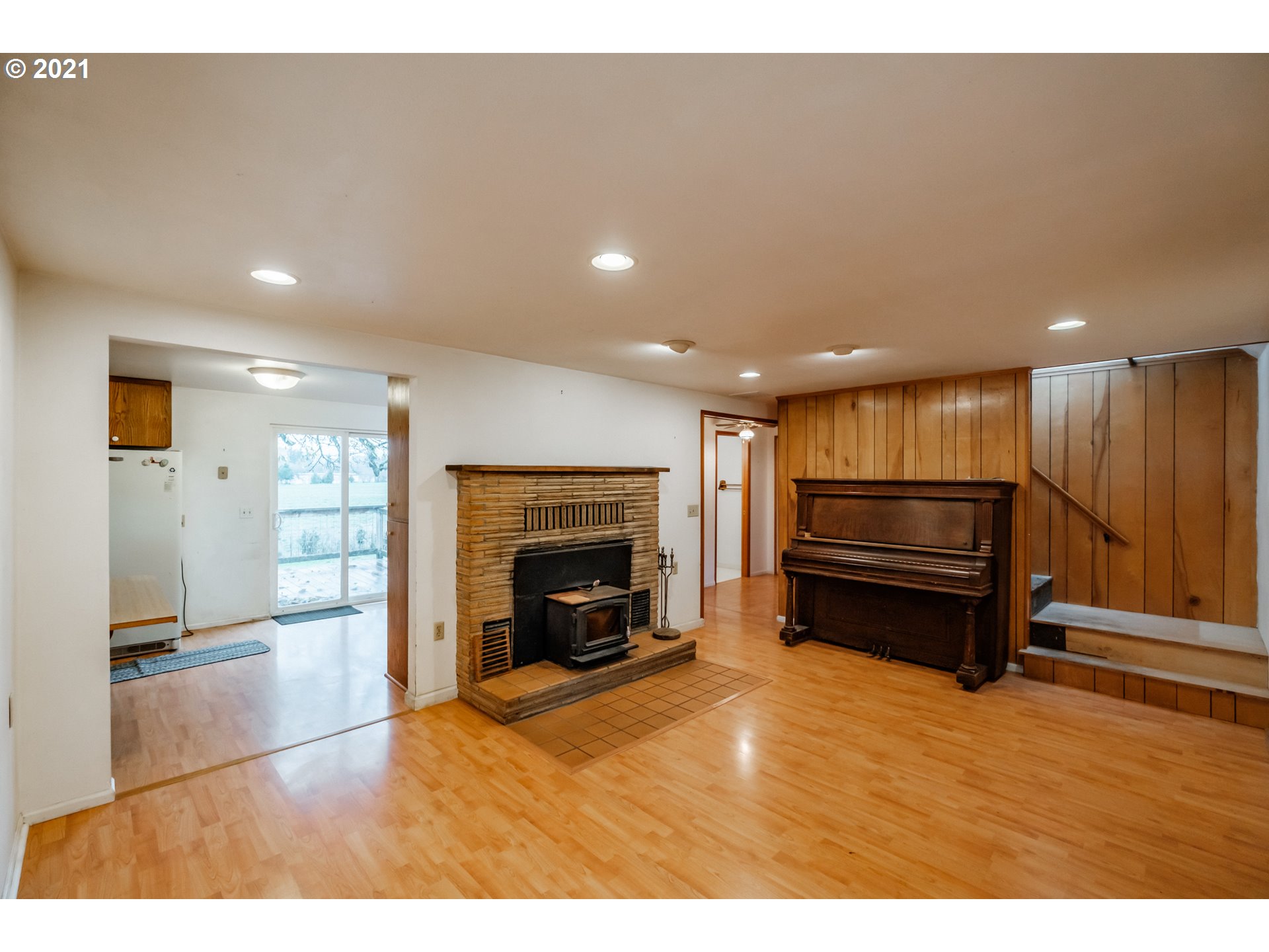 1005 Cascade Drive Lebanon, OR 97355 - Photo 8 of 32 a kitchen with a refrigerator and a stove top oven