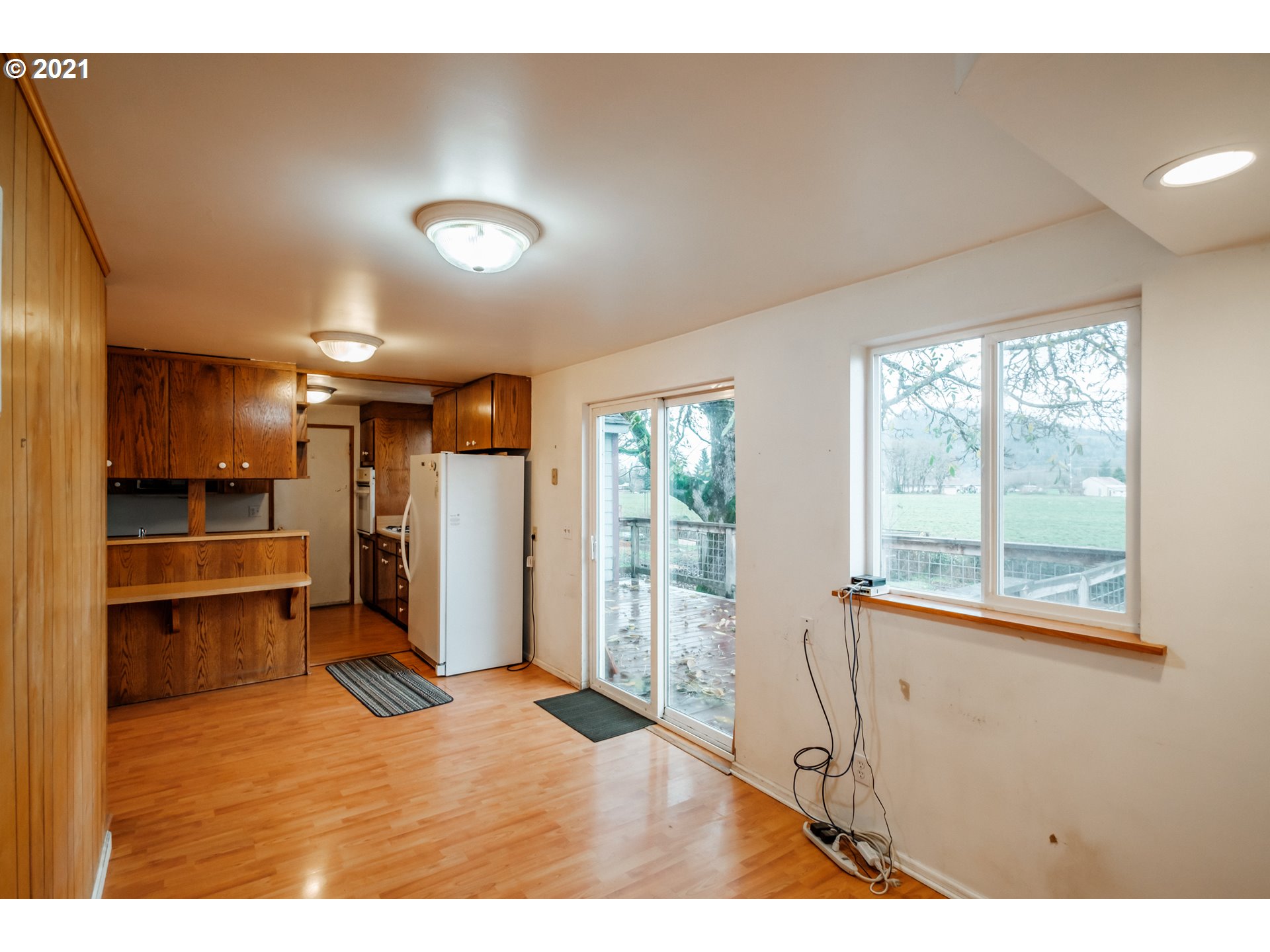 1005 Cascade Drive Lebanon, OR 97355 - Photo 10 of 32 a view of an empty room with a window