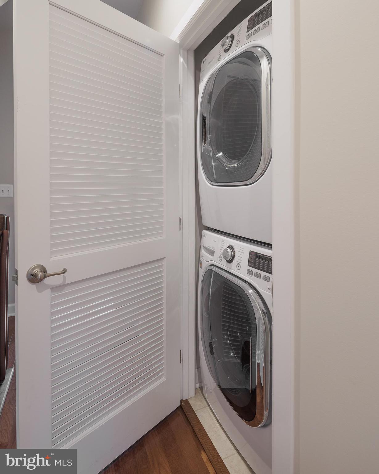 22355 Exe Square Ashburn, VA 20148 - Photo 16 of 65 a view of a hallway with washer and dryer