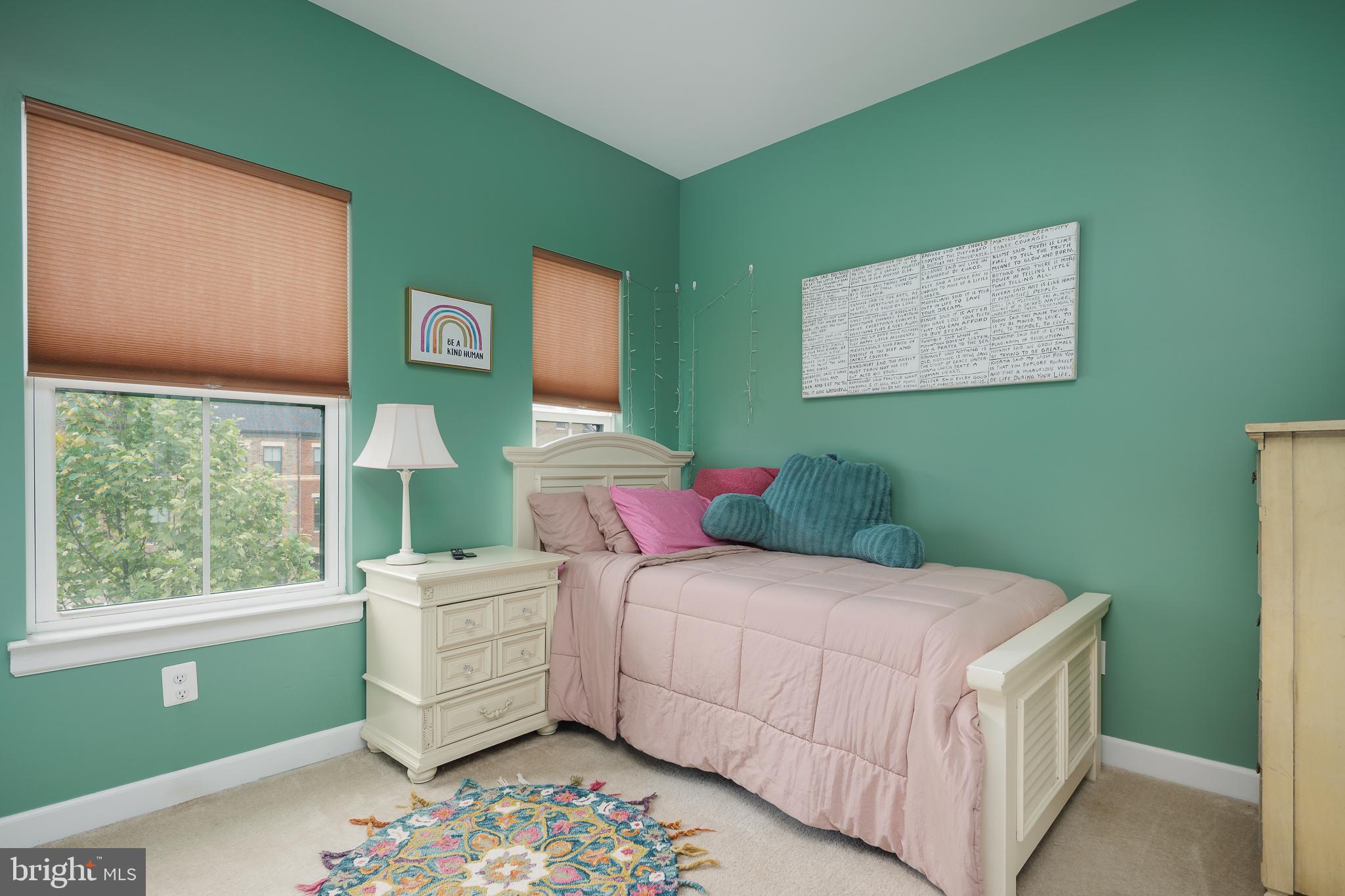 22355 Exe Square Ashburn, VA 20148 - Photo 17 of 65 a bedroom with a bed and window