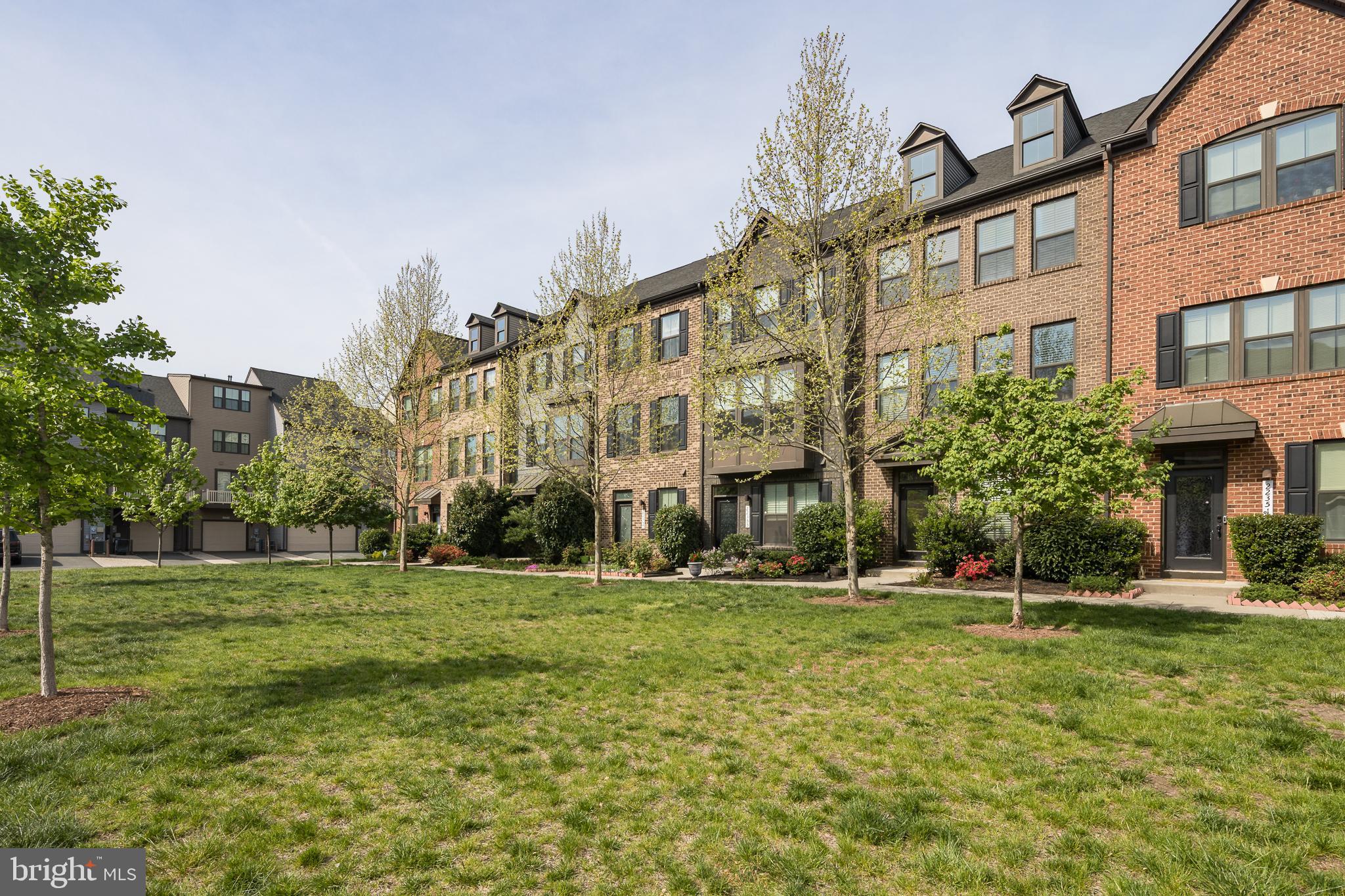 22355 Exe Square Ashburn, VA 20148 - Photo 30 of 65 a view of a building with a yard