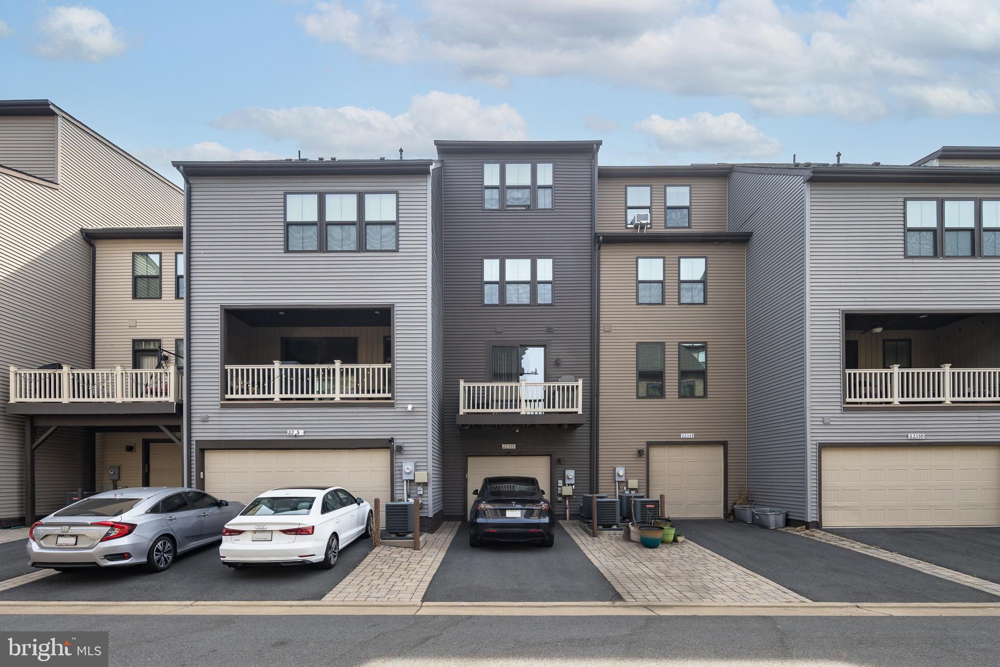 22355 Exe Square Ashburn, VA 20148 - Photo 31 of 65 a car parked in front of a building