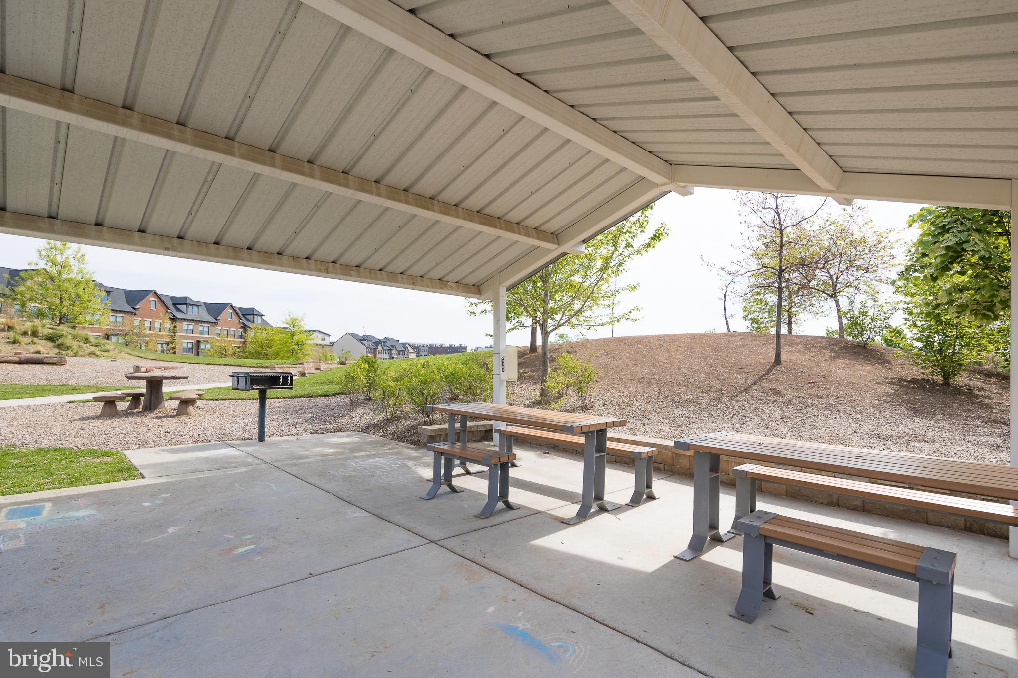 22355 Exe Square Ashburn, VA 20148 - Photo 55 of 65 a view of chairs and tables in the patio