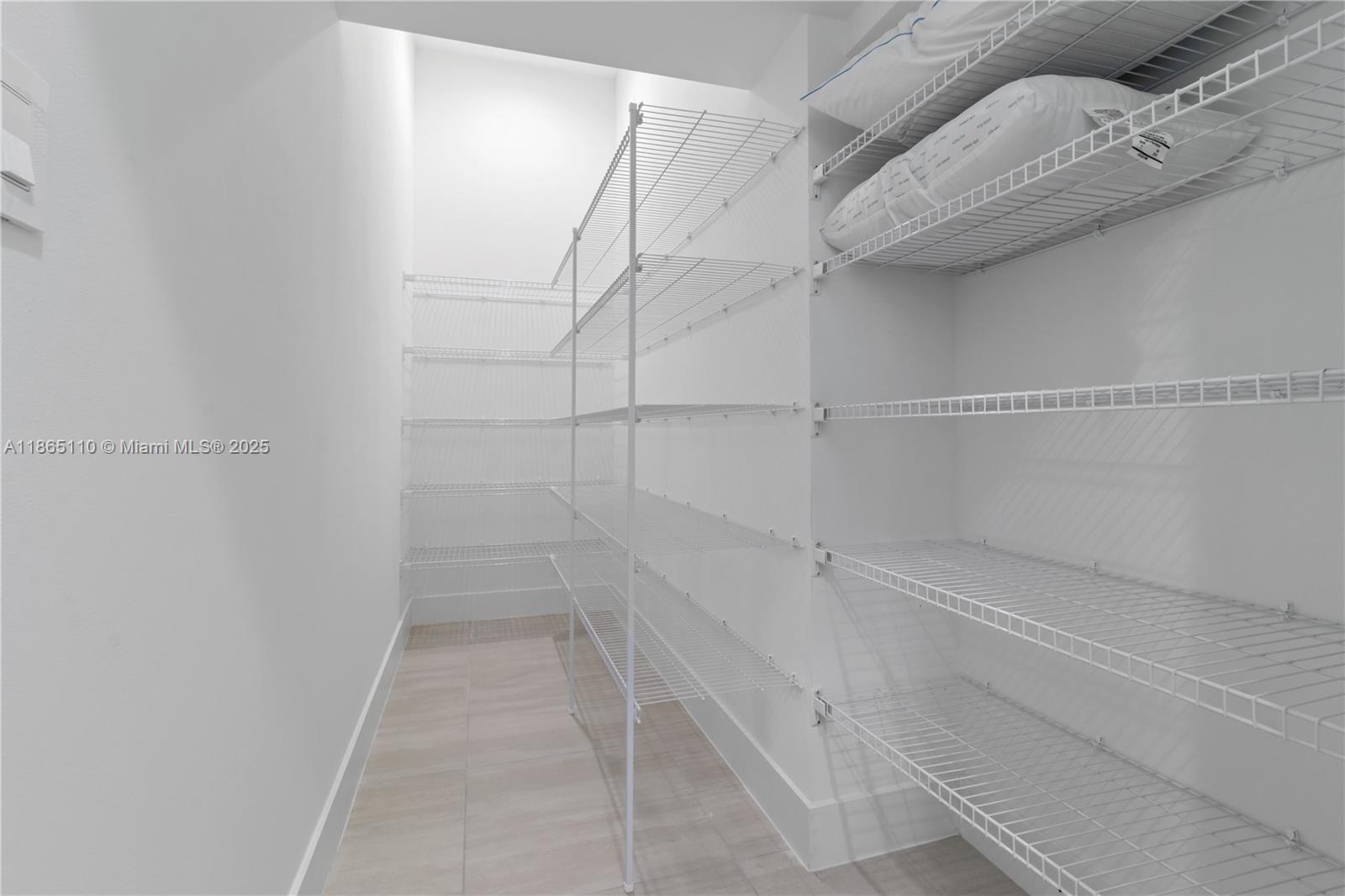 2391 Southwest 123rd Terrace Davie, FL 33325 - Photo 17 of 39 a view of a room with racks on the wall