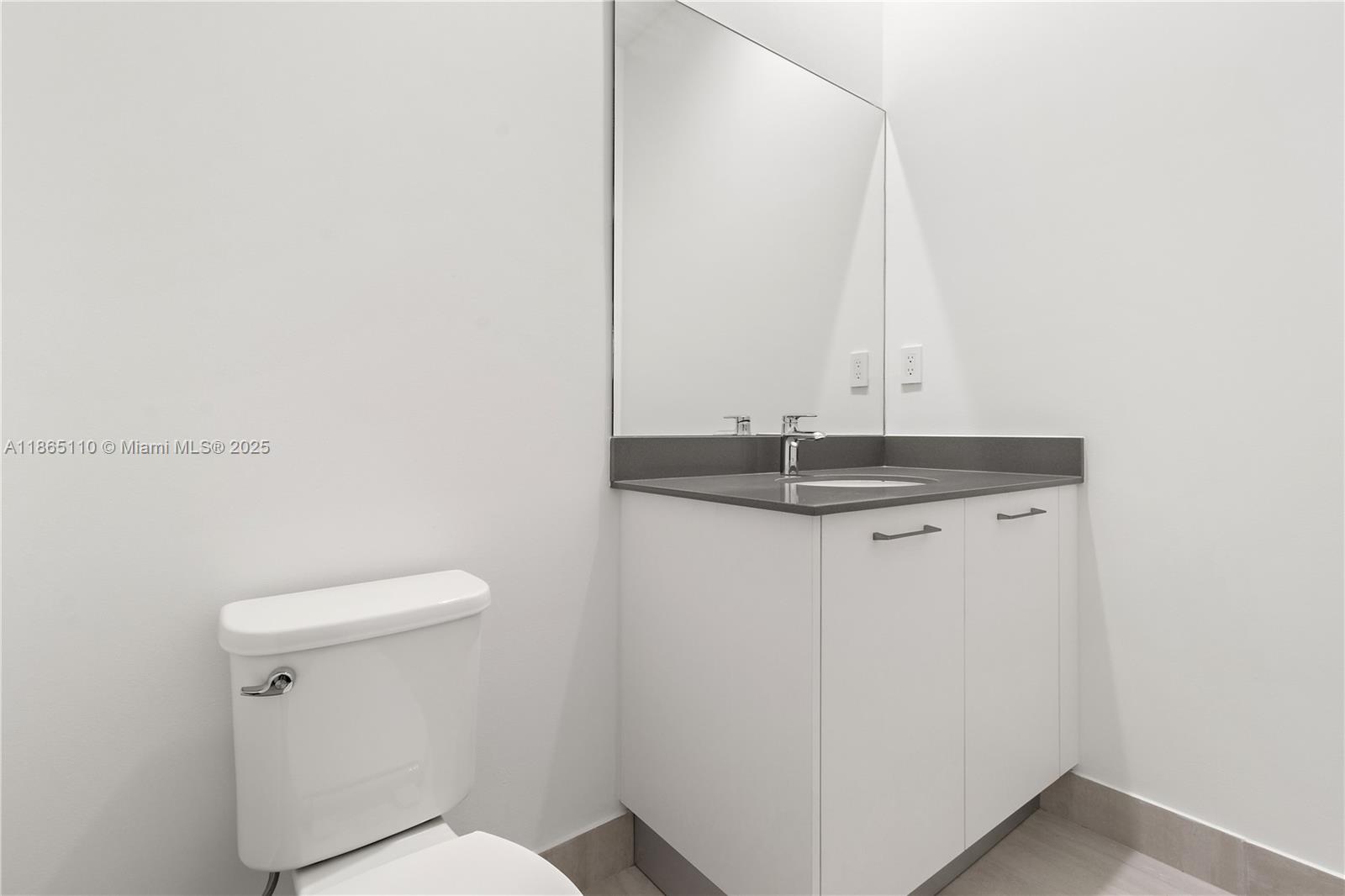 2391 Southwest 123rd Terrace Davie, FL 33325 - Photo 19 of 39 a close view of a sink and a toilet