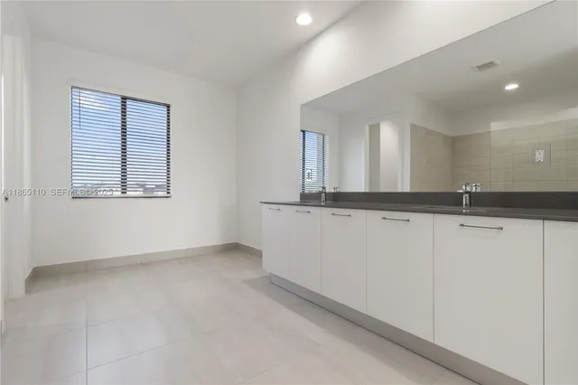 a bathroom with a shower and a toilet