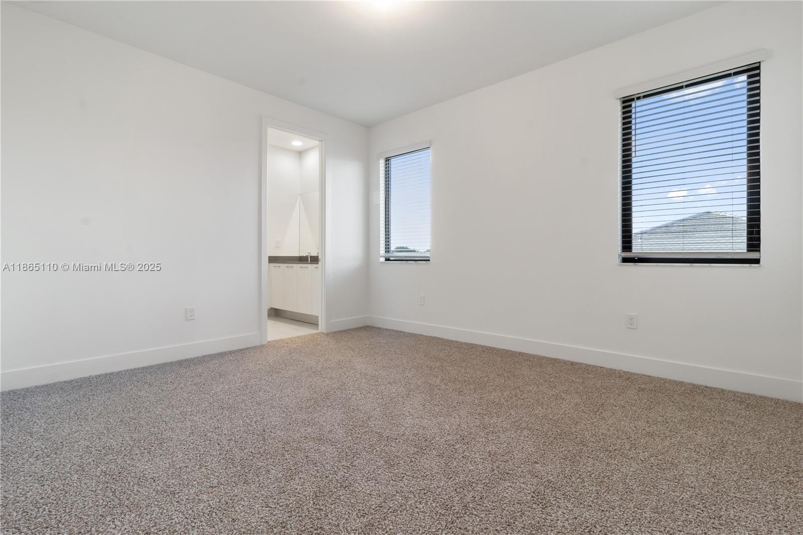 2391 Southwest 123rd Terrace Davie, FL 33325 - Photo 35 of 39 an empty room with windows