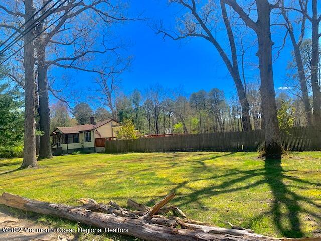 248 Perrineville Road Jackson, NJ 08527 - Photo 33 of 40 a view of a swimming pool with an outdoor space and seating area