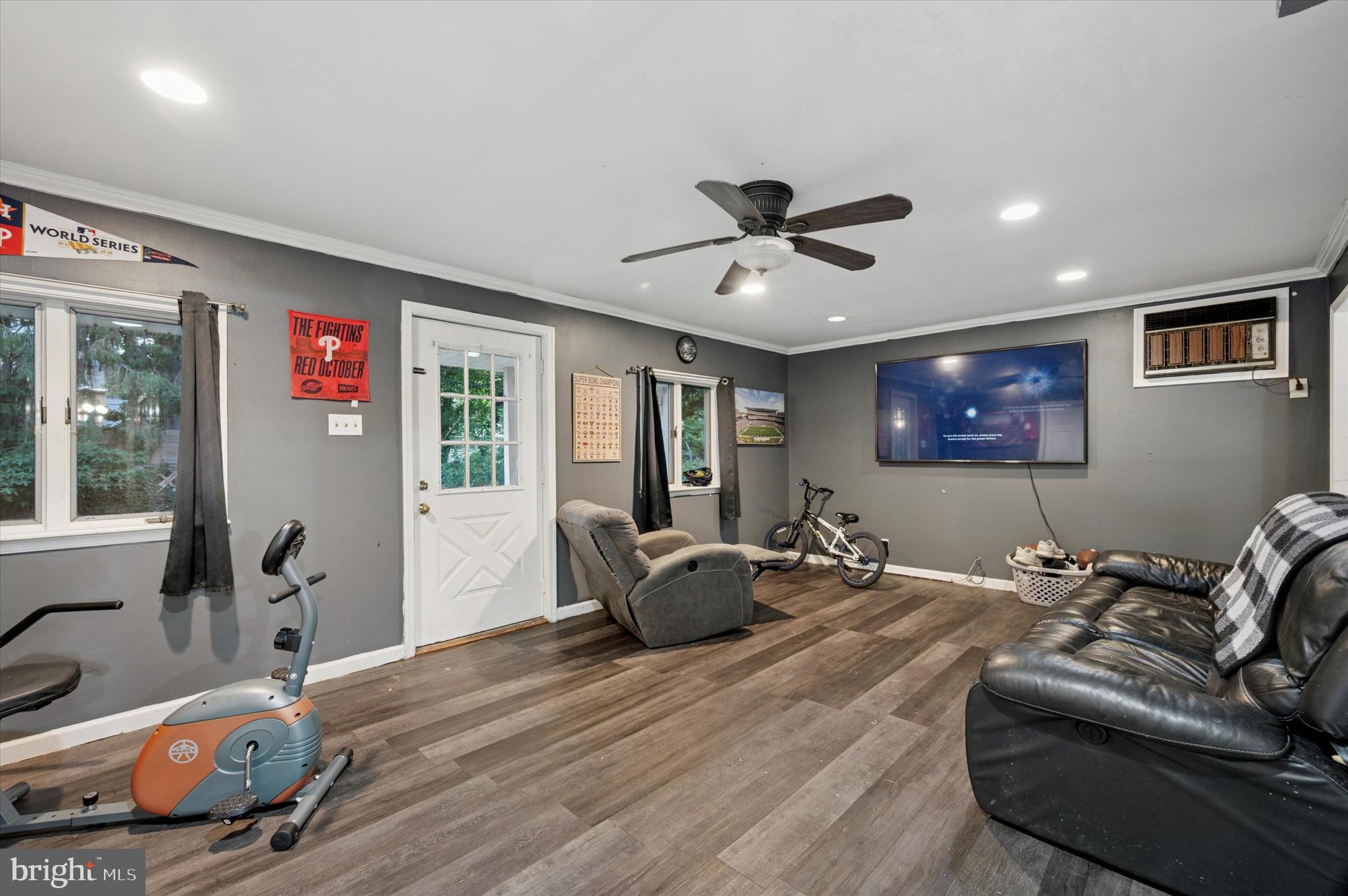 2379 Mole Road Secane, PA 19018 - Photo 13 of 26 a living room with furniture chandelier and a window
