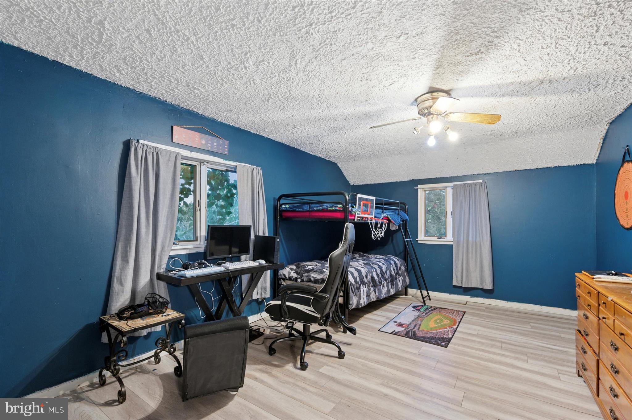 2379 Mole Road Secane, PA 19018 - Photo 18 of 26 a view of a workspace with furniture and a ceiling fan