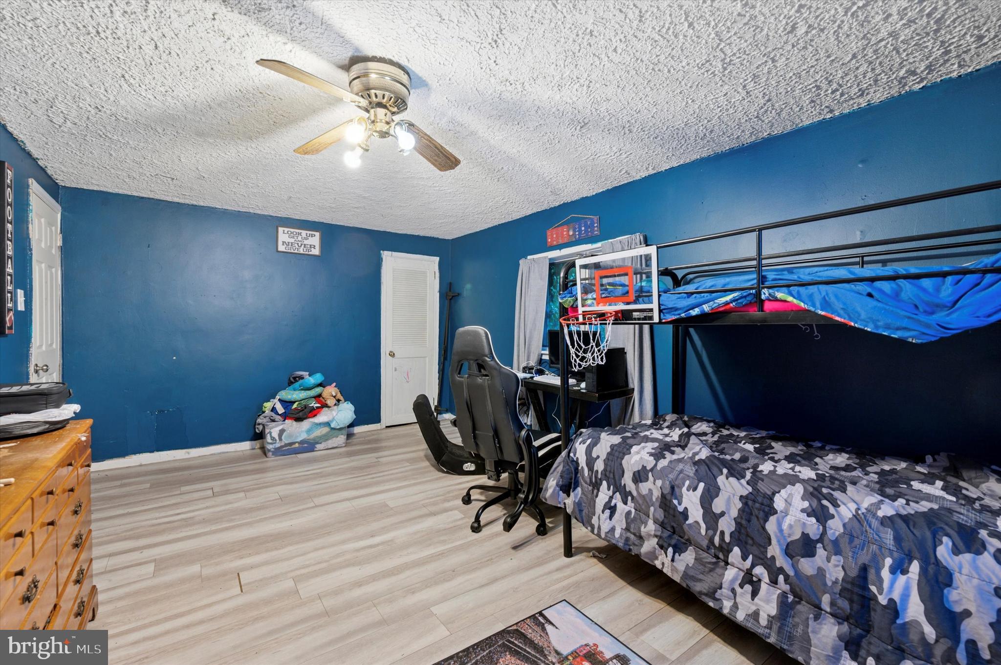 2379 Mole Road Secane, PA 19018 - Photo 19 of 26 a bedroom with bed and glass windows
