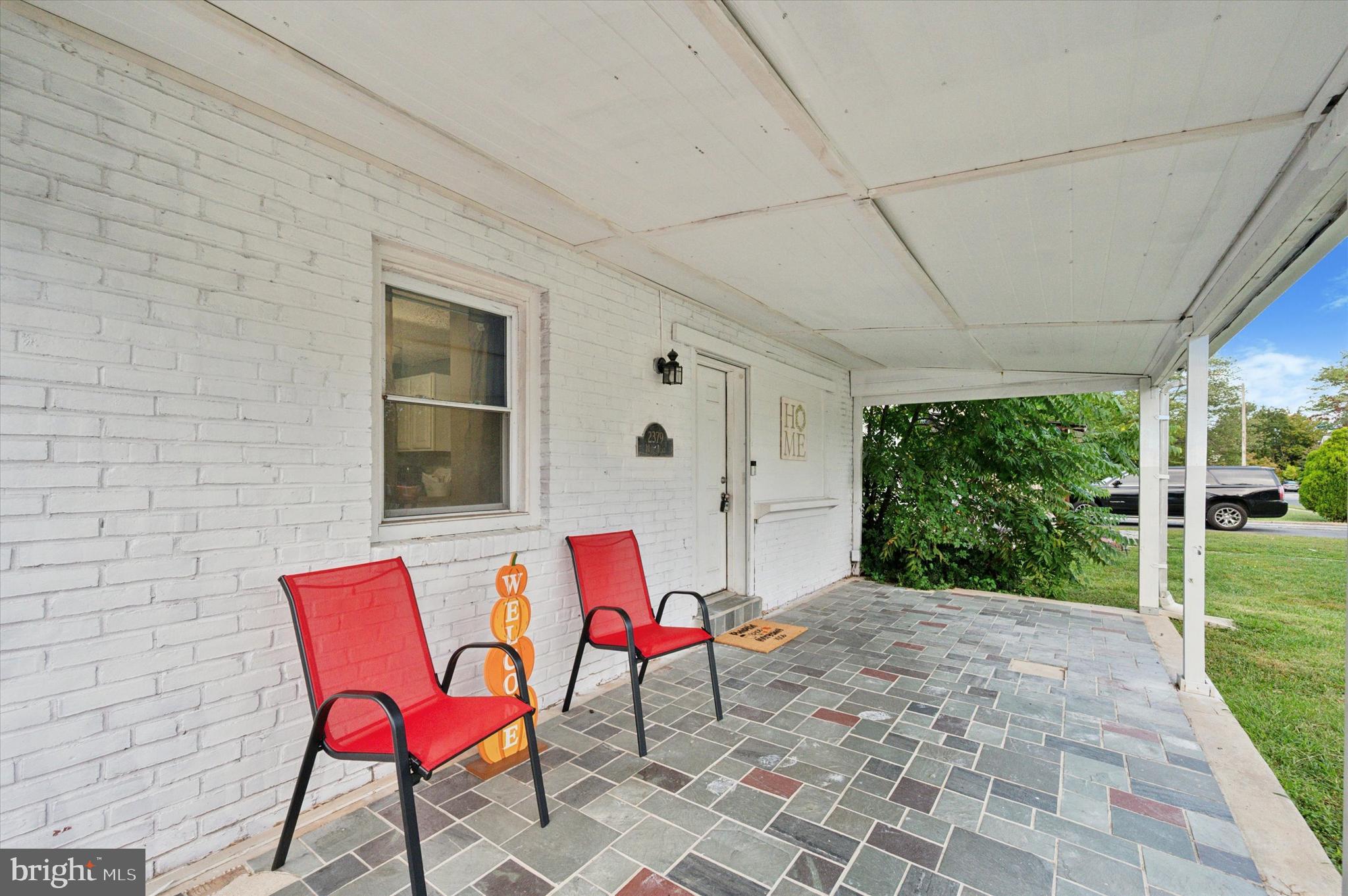 2379 Mole Road Secane, PA 19018 - Photo 4 of 26 a view of a chairs and table in patio