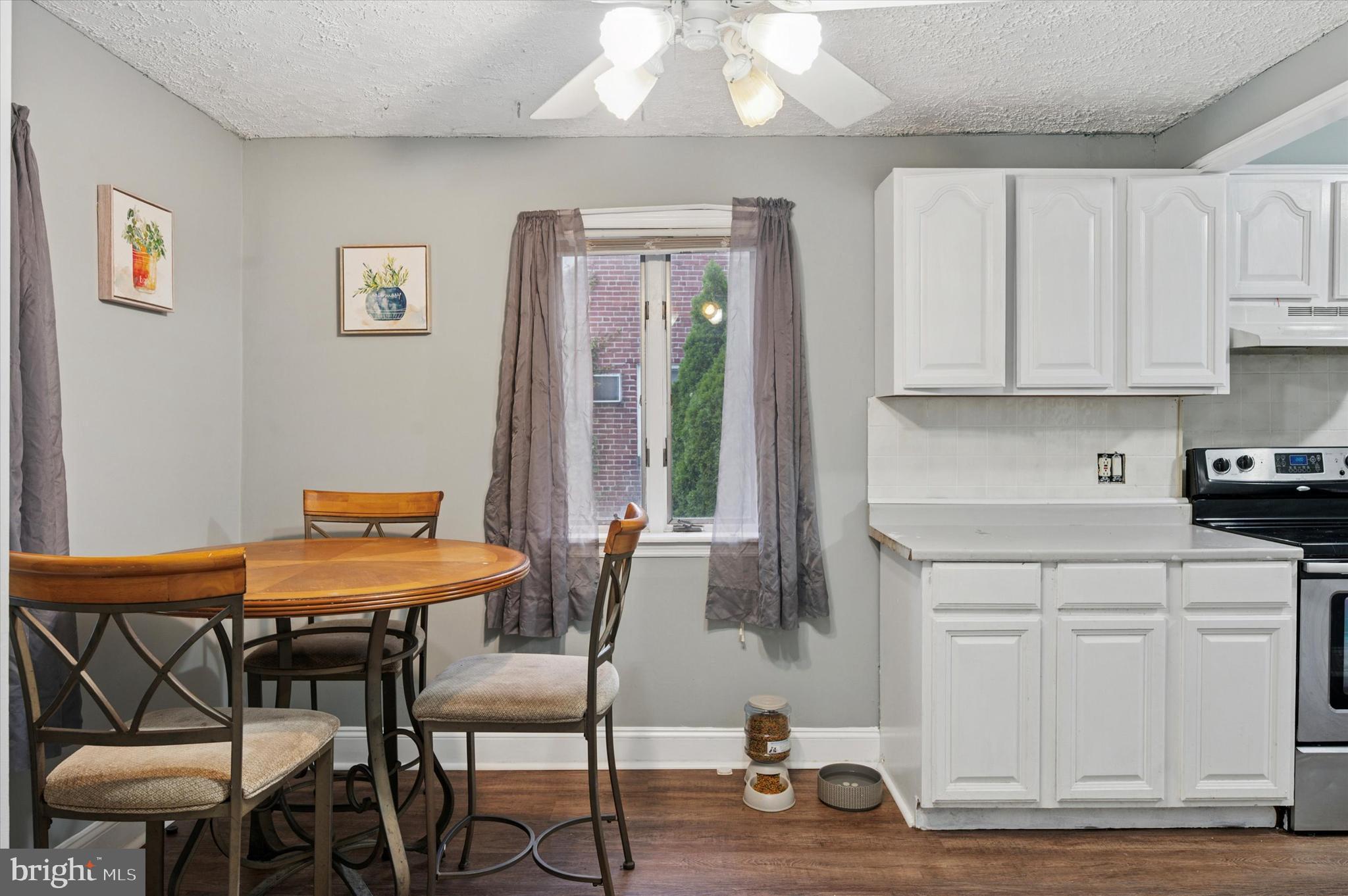 2379 Mole Road Secane, PA 19018 - Photo 8 of 26 a view of a dining room with furniture and wooden floor