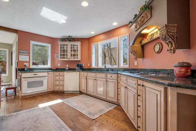 a bathroom with a glass shower door