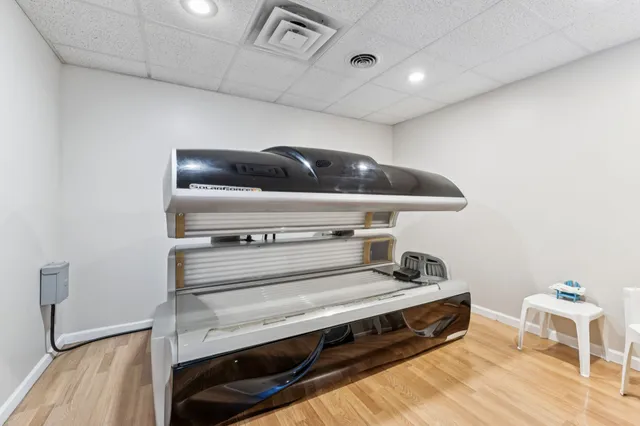 a view of workspace with wooden floor