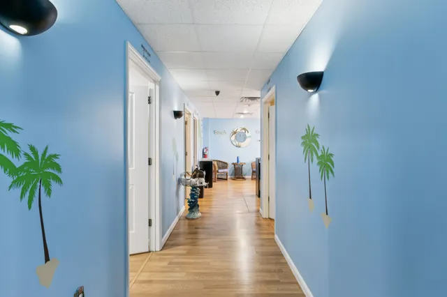 a view of workspace with wooden floor