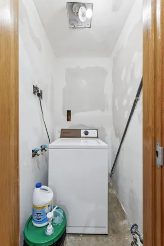 a bathroom with a toilet and a sink