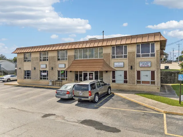 a car parked in front of a building