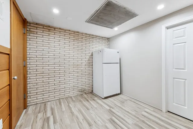 a room with furniture and a wooden floor