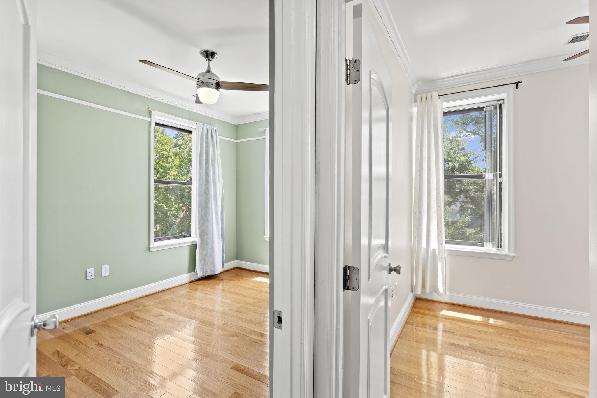 1437 Spring Road Northwest, Unit 21 Washington, DC 20010 - Photo 12 of 25 a view of an empty room with a window