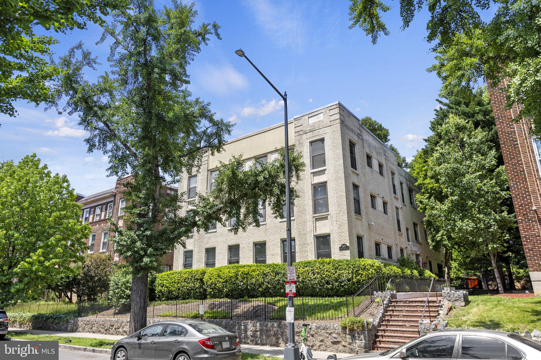 1437 Spring Road Northwest, Unit 21 Washington, DC 20010 - Photo 25 of 25 a front view of a building with garden