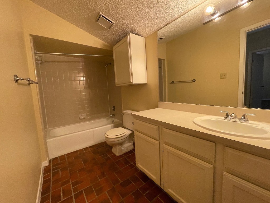 2110 Rio Grande Street, Unit 308 Austin, TX 78705 - Photo 13 of 14 a bathroom with a sink a toilet and shower