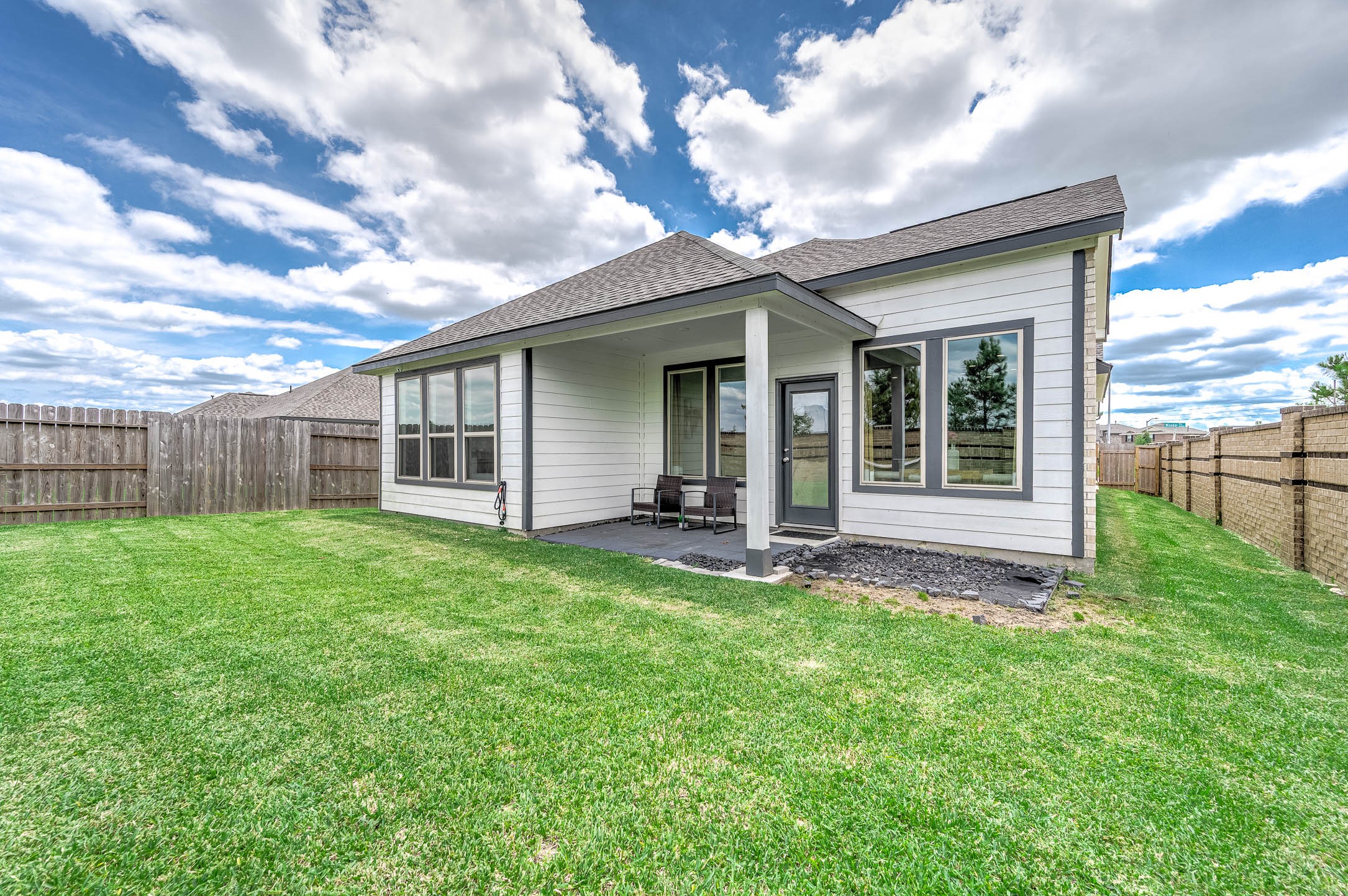 10926 Wander Way Beasley, TX 77417 - Photo 24 of 38 a view of a house with backyard and porch