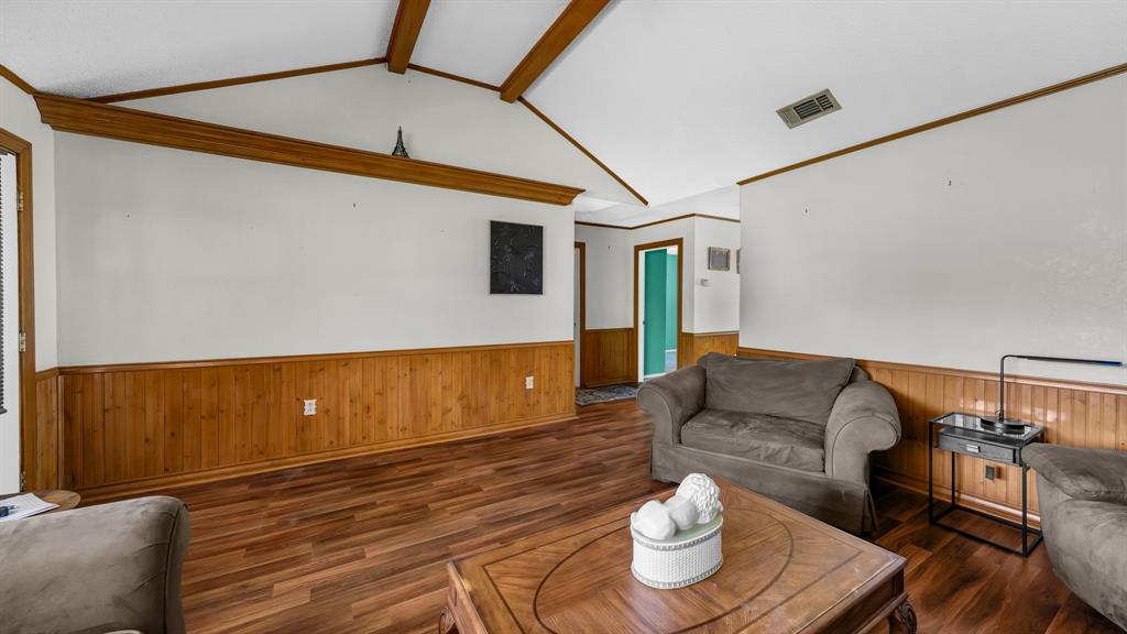 3200 Fairview Road Millsap, TX 76066 - Photo 7 of 33 a living room with furniture and wooden floor