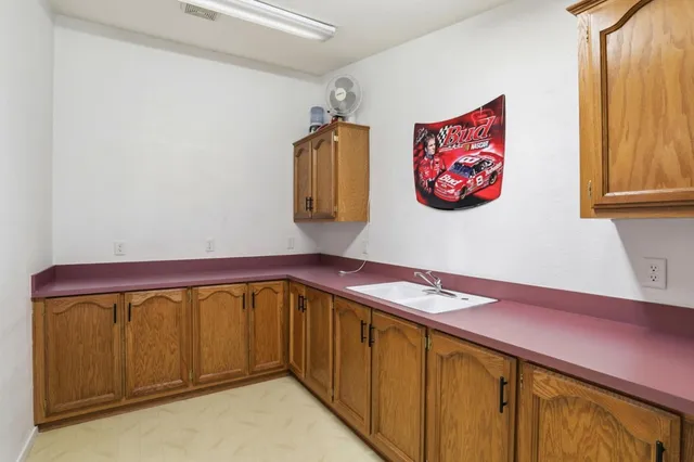 a view of a backyard with sitting area