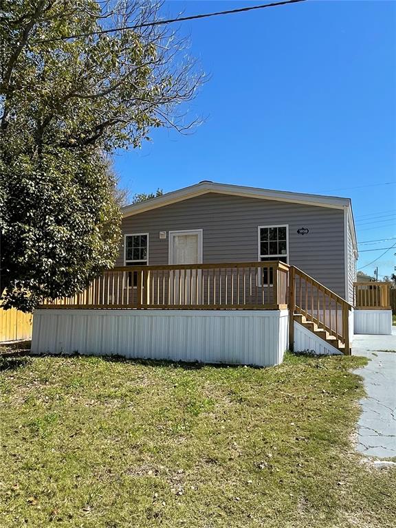 1850 Arcadia Road Holiday, FL 34690 - Photo 1 of 1 a view of a house with wooden fence