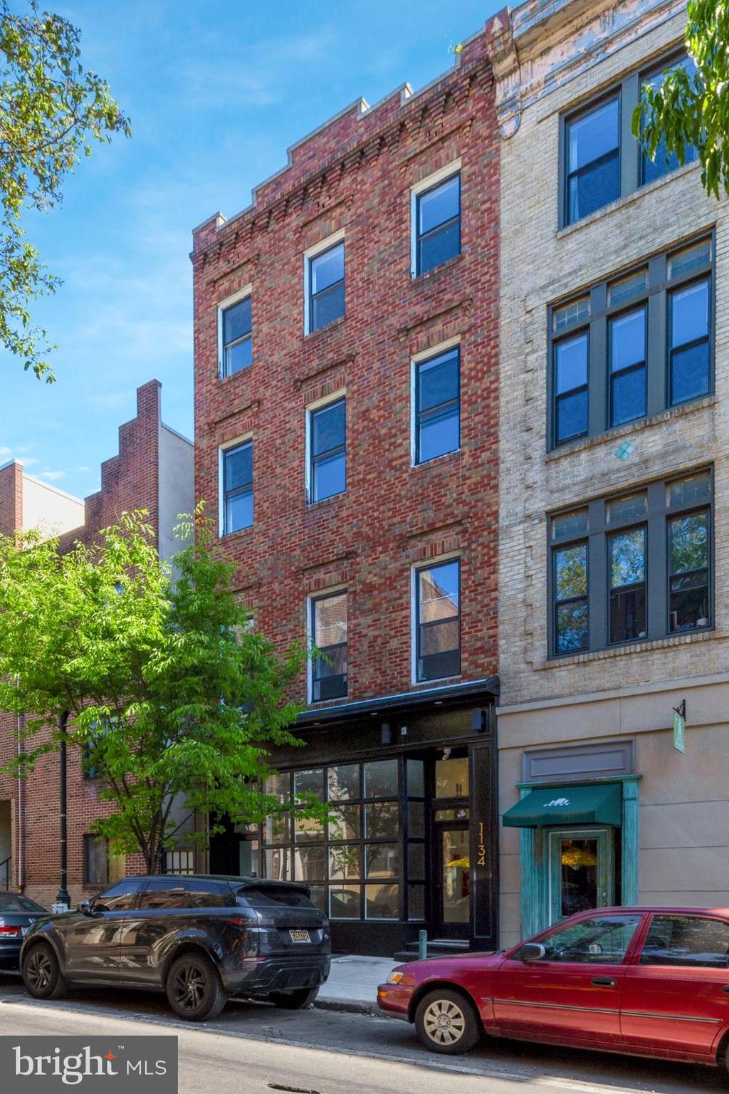 1134 Pine Street, Unit 5 Philadelphia, PA 19107 - Photo 1 of 1 a car parked in front of a building