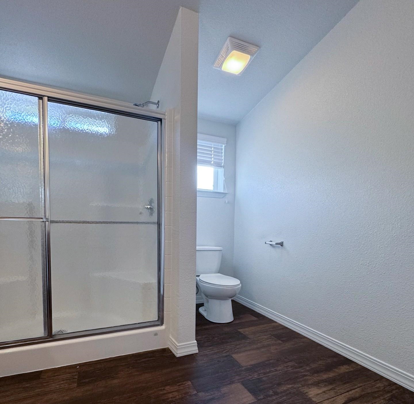 139 Tuolumne Road Bishop, CA 93514 - Photo 7 of 18 a bathroom view of a toilet and a mirror