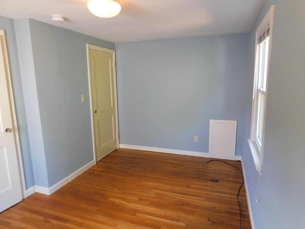 66 Notre Dame Street Springfield, MA 01104 - Photo 17 of 28 a view of a room with wooden floor