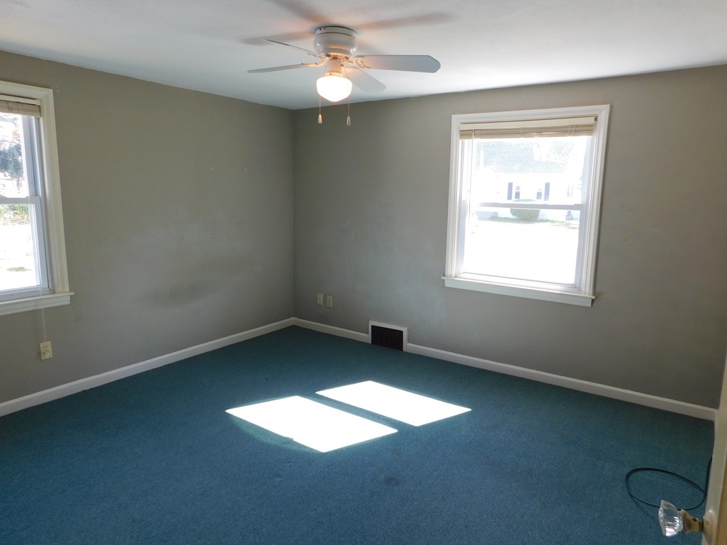 66 Notre Dame Street Springfield, MA 01104 - Photo 19 of 28 an empty room with a window