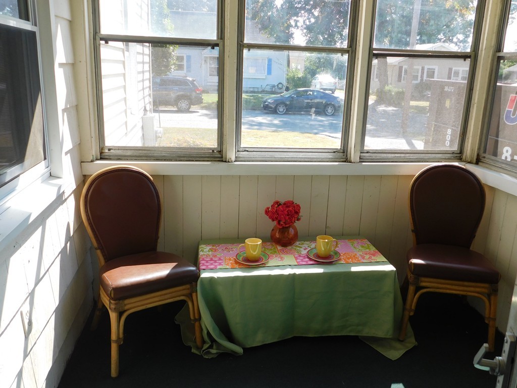 66 Notre Dame Street Springfield, MA 01104 - Photo 5 of 28 a room with furniture and a window