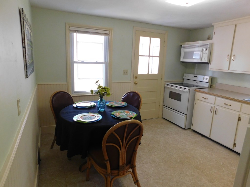 66 Notre Dame Street Springfield, MA 01104 - Photo 10 of 28 a dining room with furniture and window