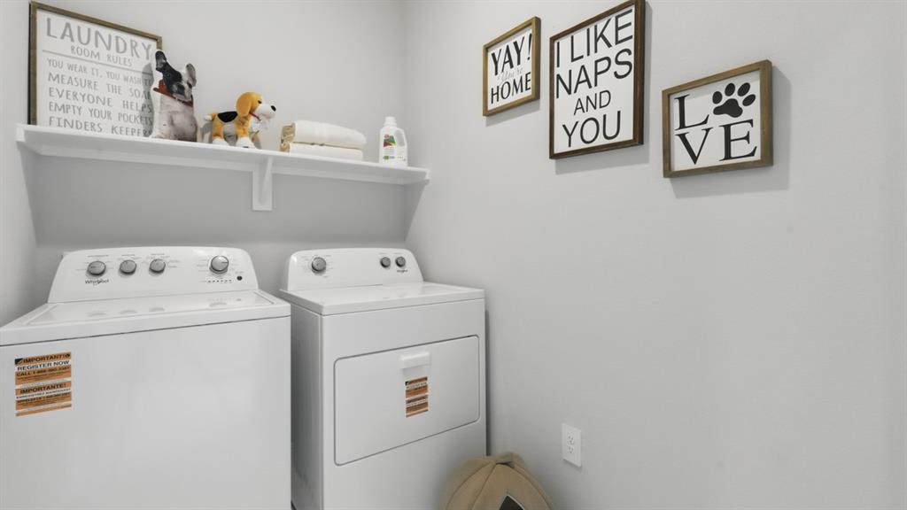 1205 Tree House Lane Decatur, TX 76234 - Photo 30 of 35 a utility room with dryer and washer