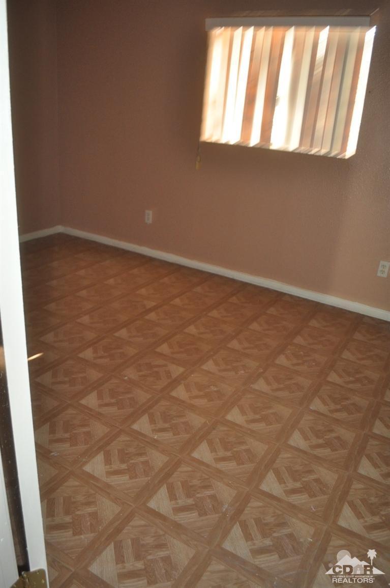 46531 Vargas Road Indio, CA 92201 - Photo 15 of 18 a view of an empty room and window
