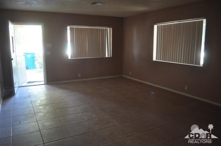 46531 Vargas Road Indio, CA 92201 - Photo 17 of 18 a view of an empty room with a window