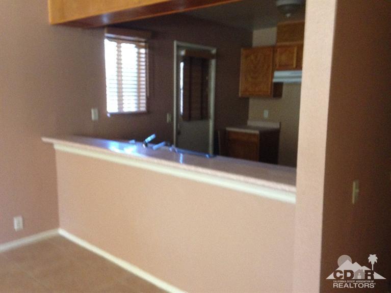46531 Vargas Road Indio, CA 92201 - Photo 3 of 18 a bathroom with a sink and a mirror