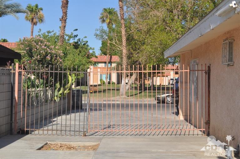 46531 Vargas Road Indio, CA 92201 - Photo 4 of 18 a view of a balcony with a potted plant