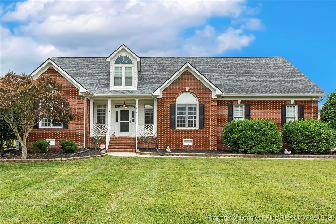 514 Averette Road Rolesville, NC 27571 - Photo 1 of 38 front view of a house with a yard