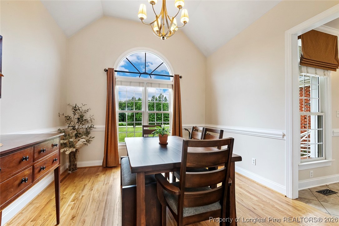 514 Averette Road Rolesville, NC 27571 - Photo 17 of 38 a view of a dining room with furniture window and outside view