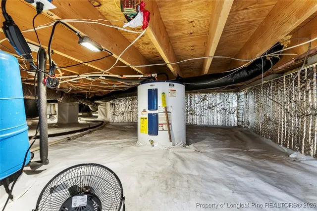 a view of a chair and table in the garden