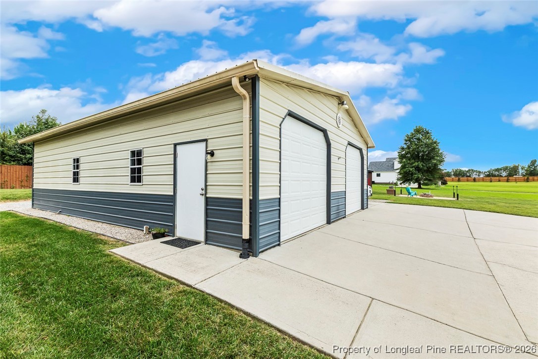 514 Averette Road Rolesville, NC 27571 - Photo 34 of 38 a front view of a house with a yard