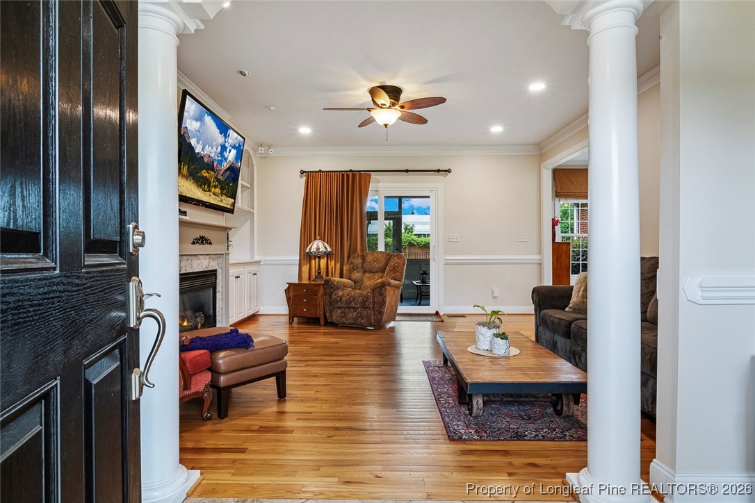 514 Averette Road Rolesville, NC 27571 - Photo 4 of 38 a living room with fireplace furniture and a flat screen tv